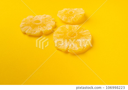 Dry Pineapple Rings Isolated, Candy Pineapples, Dehydrated Yellow Sugar Fruit, Candied Fruits Circles 106998223