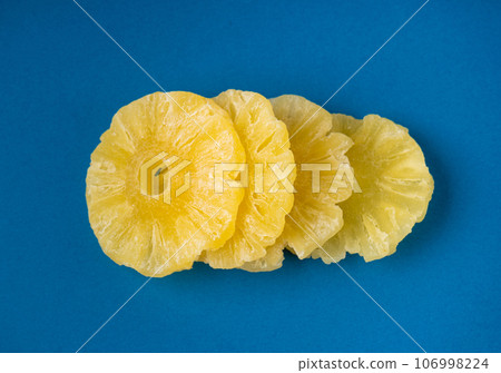 Dry Pineapple Rings Isolated, Candy Pineapples, Dehydrated Yellow Sugar Fruit, Candied Fruits Circles 106998224