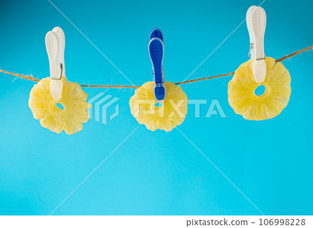 Dry Pineapple Rings Isolated, Candy Pineapples, Dehydrated Yellow Sugar Fruit, Candied Fruits Circles 106998228