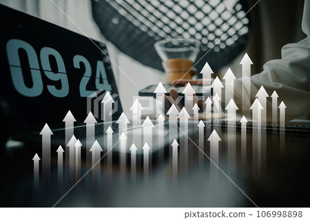 business growth concept,Light arrow pointing up on the desk business growth concept,Light arrow pointing up on the desk 106998898