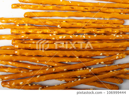 Pretzel Sticks Texture Background, Crunchy Breadsticks Pattern with Copy Space, Grissini Banner 106999444