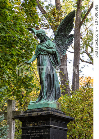 View of famous Old North Cemetery of Munich, Germany with historic gravestones. 107000969