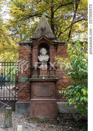View of famous Old North Cemetery of Munich, Germany with historic gravestones. 107000970