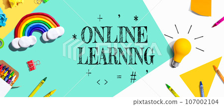 Online Learning theme with school supplies - flat lay Online Learning theme with school supplies - flat lay 107002104