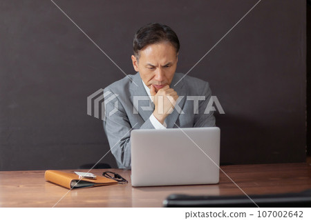 business man thinking 107002642