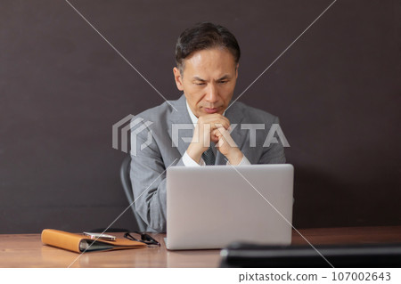 business man thinking 107002643