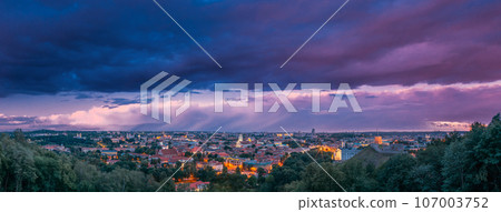 Vilnius, Lithuania. Panoramic View Unusual Violet Sunset Dramatic Sky Above Historic Center Cityscape. Old Town Travel Concept In Night Illuminations. Unesco World Heritage. Amazing Sunset Sunrise Sky 107003752