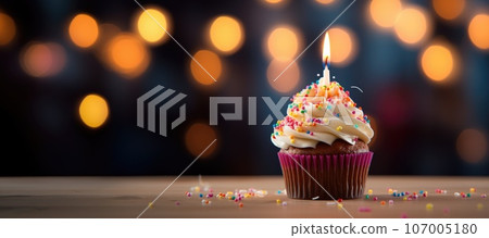 Delicious tasty cupcake with candle on dark background. 107005180