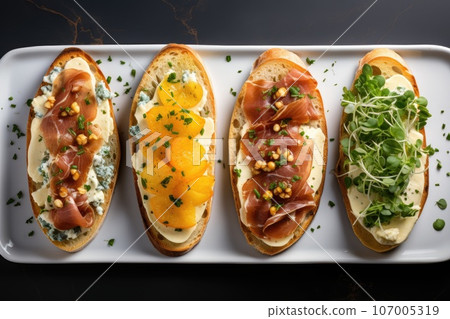 open sandwiches with pear prosciutto arugula and blue cheese. open sandwiches with pear prosciutto arugula and blue cheese. 107005319