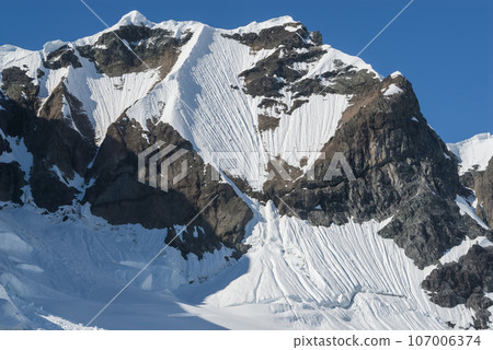 Glaciers and mountains in Paradise bay, peninsula, Antartica.. Glaciers and mountains in Paradise bay, peninsula, Antartica.. 107006374