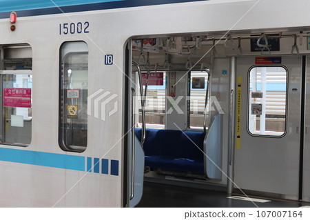 "Tokyo Metro 15000 series train" stopping at Myoden Station on the Tokyo Metro Tozai Line "Tokyo Metro 15000 series train" stopping at Myoden Station on the Tokyo Metro Tozai Line 107007164