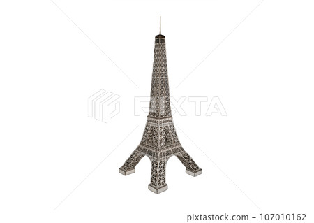 Eiffel Tower figurine made of simple material on white isolated background 107010162