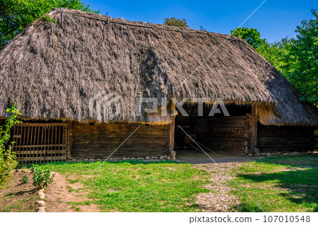 BUCHAREST, ROMANIA - Dimitrie Gusti National Village Museum, located in Herastrau Park showcasing traditional Romanian village life. BUCHAREST, ROMANIA - Dimitrie Gusti National Village Museum, located in Herastrau Park showcasing traditional Romanian village life. 107010548