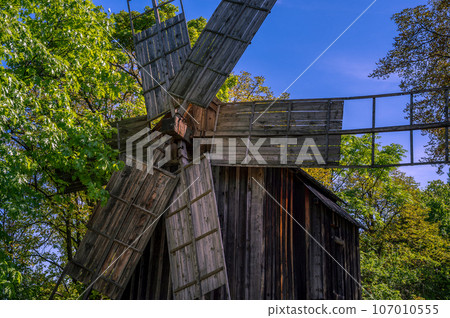 BUCHAREST, ROMANIA: 19th Century Old Windmill In Dimitrie Gusti National Village Museum (Muzeul Satului). BUCHAREST, ROMANIA: 19th Century Old Windmill In Dimitrie Gusti National Village Museum (Muzeul Satului). 107010555