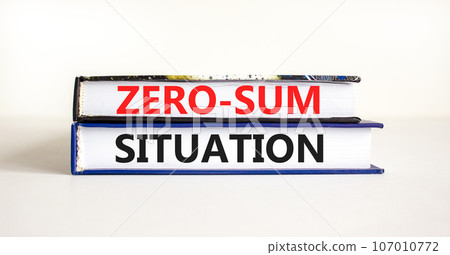 Zero-sum situation symbol. Concept words Zero-sum situation on beautiful books. Beautiful white table white background. Business psychology zero-sum situation concept. Copy space. 107010772