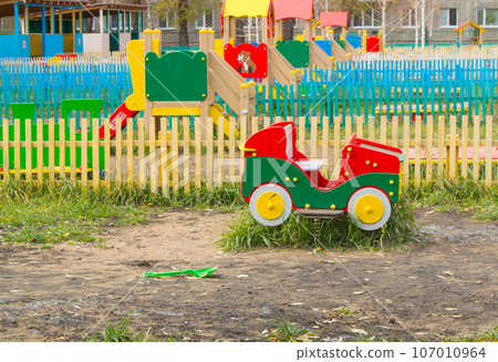 Colorful children's Playground in a Sunny, toy car Colorful children's Playground in a Sunny, toy car 107010964