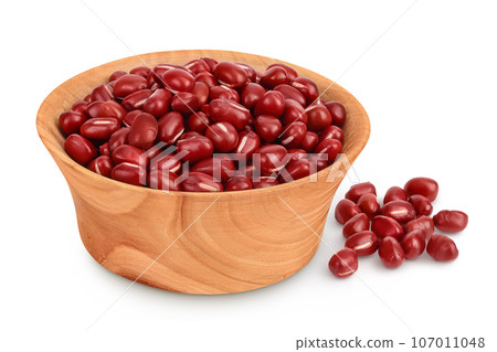 Red adzuki beans in wooden bowl isolated on white background Red adzuki beans in wooden bowl isolated on white background 107011048