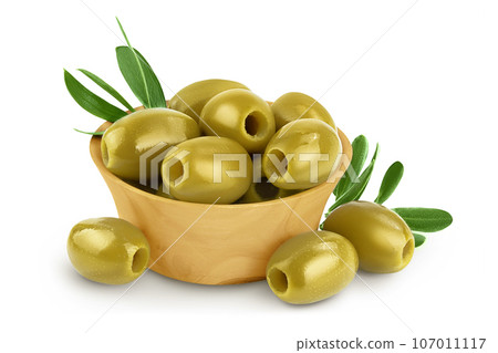 Green olives with leaves in wooden bowl isolated on a white background with full depth of field 107011117