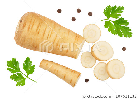 Parsnip root and slices isolated on white background closeup. Top view. Flat lay Parsnip root and slices isolated on white background closeup. Top view. Flat lay 107011132
