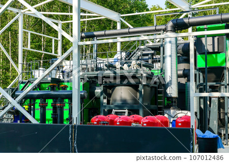 New modern unfinished wood chip biofuel boiler house for increased heat energy production efficiency New modern unfinished wood chip biofuel boiler house for increased heat energy production efficiency 107012486