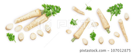 Parsley root with slices and leaves isolated on white background. Top view. Flat lay Parsley root with slices and leaves isolated on white background. Top view. Flat lay 107012875