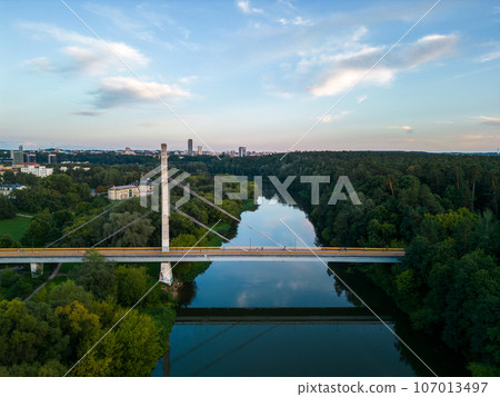 Bridge to Vingis park over the River Neris, Vilnius, Lithuania. 107013497