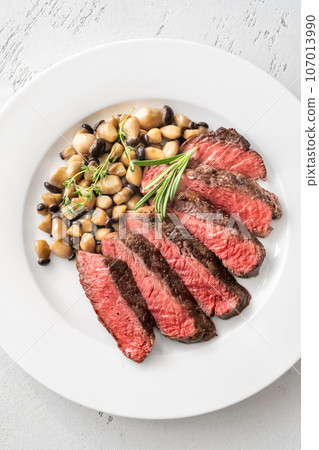 Steak rib eye with mushrooms Steak rib eye with mushrooms 107013990
