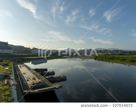Type 92 floating bridge and power boat during river crossing training Type 92 floating bridge and power boat during river crossing training 107014072