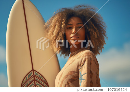 Female black surfer with surf board, lifestyle closeup portrait 107016524