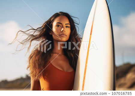 Female Hispanic surfer with surf board, lifestyle closeup portrait Female Hispanic surfer with surf board, lifestyle closeup portrait 107016785