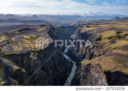Aerial view of canyon in Fjallabak Nature Reserve, Iceland on sunny autumn day. Aerial view of canyon in Fjallabak Nature Reserve, Iceland on sunny autumn day. 107018356
