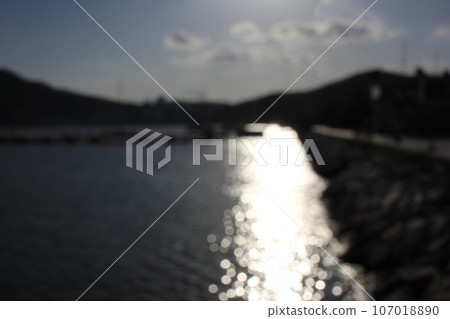 September 9, 2023: Jinhaeru in Jinhae, Jinhae-gu, Changwon-si, Gyeongsangnam-do, South Korea, beach sunset bokeh 107018890