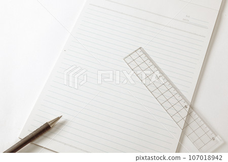 Blank report, ballpoint pen and ruler sepia Blank report, ballpoint pen and ruler sepia 107018942