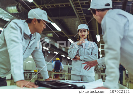 People working in the factory People working in the factory 107022131