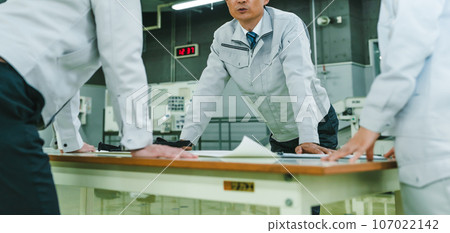People working in the factory People working in the factory 107022142