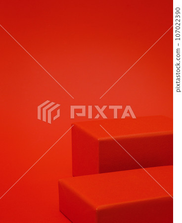 Two empty red rectangular podiums on red background Two empty red rectangular podiums on red background 107022390