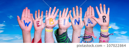 Children Hands Building Word Webinar, Blue Sky Children Hands Building Word Webinar, Blue Sky 107022864
