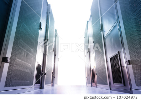 Data center with a row of server racks 107024972