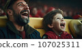 Young boy and his dad laugh at the football game. AI-generated content. 107025311