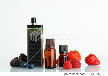 Vape smoking liquid with berry flavor close up Vape smoking liquid with berry flavor close up 107026135