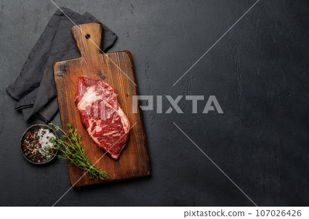 Raw beef ribeye steak Raw beef ribeye steak 107026426