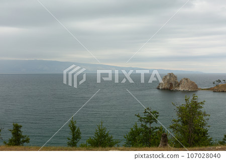 Shore of Lake Baikal. Olkhon Island, Shaman Rock Shore of Lake Baikal. Olkhon Island, Shaman Rock 107028040