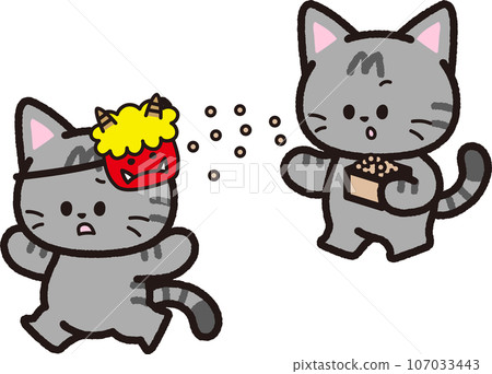 A mackerel tabby cat throws beans towards the demon mask during Setsubun. 107033443