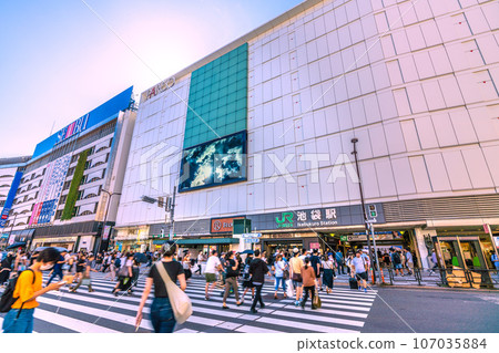 Tokyo cityscape in Japan September. The intense heat continues... The east exit of JR Ikebukuro Station is surrounded by blue skies. Escape from coronavirus and enter an era of hope = 18th 107035884