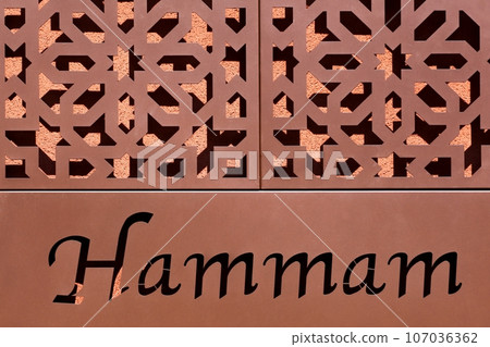 Hammam sign on a wall 107036362