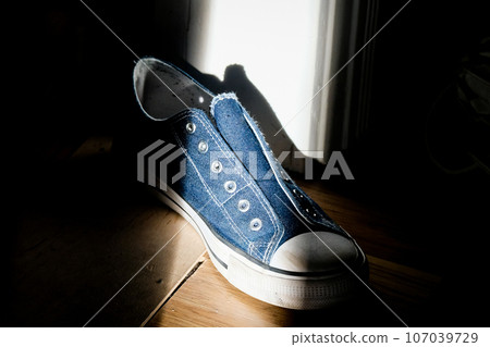 Dropped sneaker in room, teen issues, youth mental health, teen depression 107039729