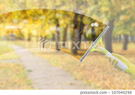 Window cleaning service during autumn. Window cleaning service during autumn. 107040298