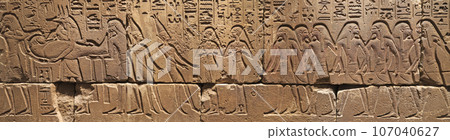 Panoramic picture with Egyptian stone carved showing a burial ceremony Panoramic picture with Egyptian stone carved showing a burial ceremony 107040627