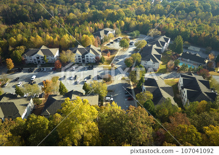 Aerial view of american apartment buildings in South Carolina residential area. New family condos as example of real estate development in USA suburbs 107041092