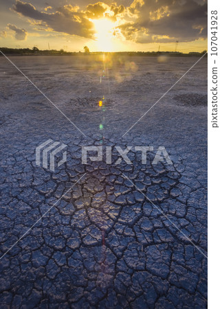 Broken dry soil in a Pampas lagoon, La Pampa province, Patagonia, Argentina. Broken dry soil in a Pampas lagoon, La Pampa province, Patagonia, Argentina. 107041928